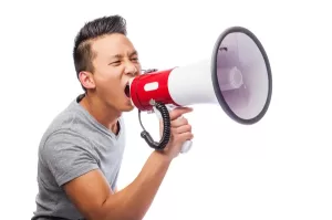 yelling into megaphone